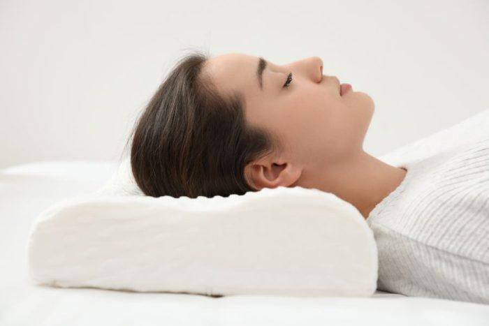 Contoured pillow spinal care